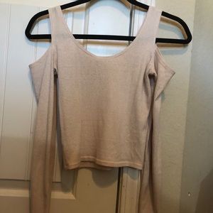 Cropped and open-shoulder cream long sleeve top